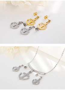 Ensemble détaillé de boucles d'oreilles ancre or et argent avec collier zircon assorti