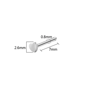 Macro detail of silver stainless steel heart nose stud with 2.6mm head and 0.8mm gauge