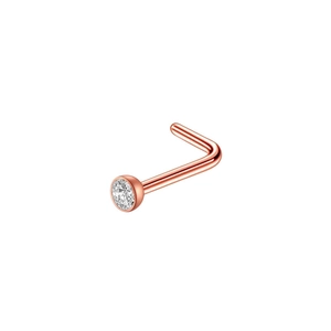Macro detail of L-shaped rose gold nose stud with a round white zircon stone