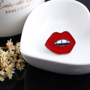 Creative red lip enamel brooch pin for clothes and hats accessory on white plate