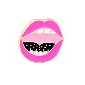 Pink lips enamel brooch with white teeth and gold trim on clean white background