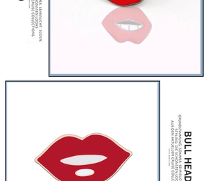 Detailed close-up of vibrant red and pink enamel lip brooches with metallic gold edging
