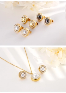 Detailed set of gold pearl pendant necklace and matching rhinestone studded earrings