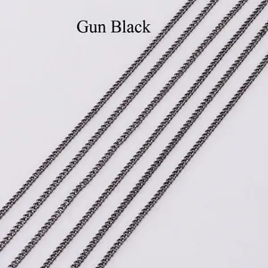 Detailed close-up of 5 meters of flat gunmetal black metal curb chains for jewelry making