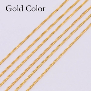Detail of gold-plated fine link chains for DIY jewelry making with metallic glossy finish
