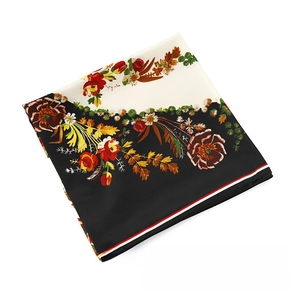 Detail of floral butterfly print silk scarf with color-block design and striped edges