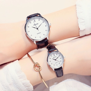 Minimalist quartz couple watches with white diamond dials and black leather straps