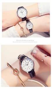 Close-up of KEZZI quartz watches with black leather straps and crystal markers