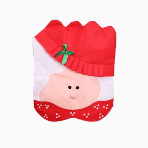 Festive Christmas chair cover featuring colorful patchwork design and a cute green bow