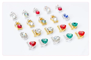Detailed view of luxury heart and teardrop shaped rhinestone alloy nail charms