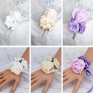 Artificial wedding corsage and wristlet set in white, champagne, and purple tones