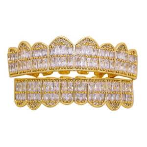 Detailed macro shot of 18K gold-plated hip hop grillz with iced-out square zircon inlay