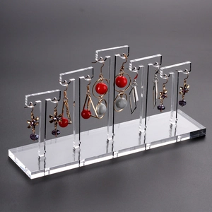 Transparent acrylic T-bar earring display stand with 5 levels on a rectangular base