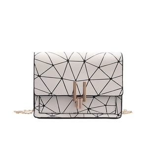 White geometric shoulder bag with gold chain strap and black line texture for women