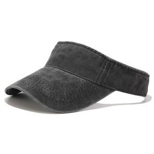 Close-up of washed cotton sun visor showing twill texture and reinforced brim stitching