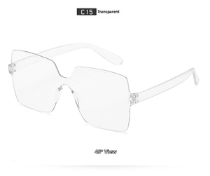 Detail shot of oversized transparent rimless sunglasses with a 45-degree angle view