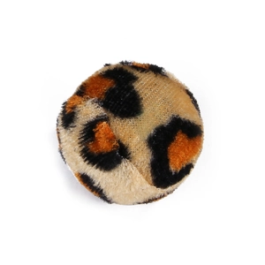 Vue détaillée d'un accessoire rond à imprimé léopard avec une texture en velours doux