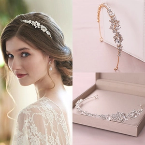 Detail of elegant gold and silver leaf bridal headbands with crystals and pearls