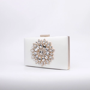 Elegant white satin evening clutch bag with crystal floral ornament and gold chain strap