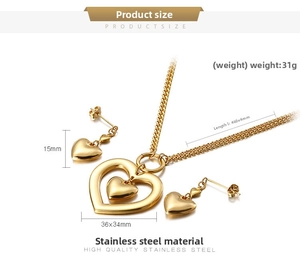 Close-up of gold stainless steel heart necklace and earrings set with detailed dimensions