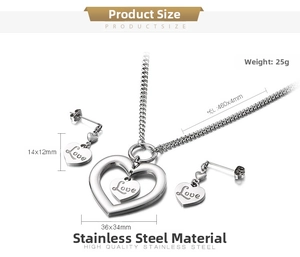 Detail view of the silver heart necklace and earrings set with measurements and Love engraving