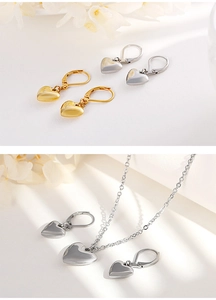 Détail d'un ensemble de bijoux avec boucles d'oreilles et collier en forme de cœur
