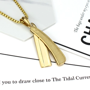 Men's gold titanium steel razor blade pendant necklace with textured grid detail
