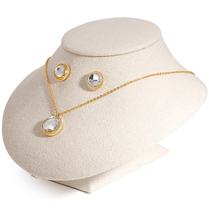 Elegant gold titanium jewelry set with sparkling round cubic zirconia necklace and earrings