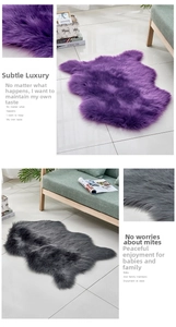 Close-up of thick purple and dark grey faux cashmere plush rugs with irregular shapes