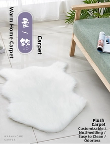 Detail of a white faux sheepskin rug with plush texture on a living room floor