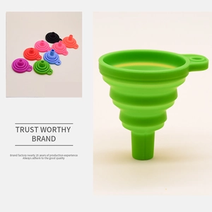 Close-up of collapsible silicone kitchen funnels in various colors with hanging holes