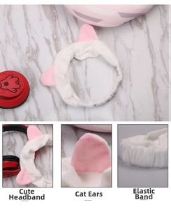 Close-up of white plush cat ear headband with thick elastic band for face washing