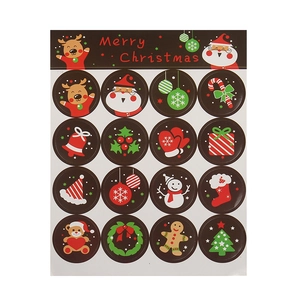Christmas sealing stickers with Santa and reindeer motifs for holiday gift packaging