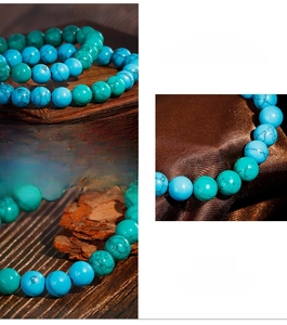 Detailed view of turquoise beaded bracelet with natural textures on wooden background