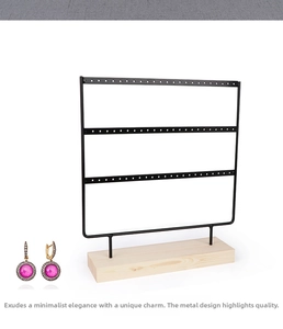 Three-tier black metal earring display stand with a solid natural wooden base detail