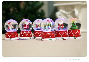 Detailed set of 6 glowing Christmas snow globes with festive LED resin figures