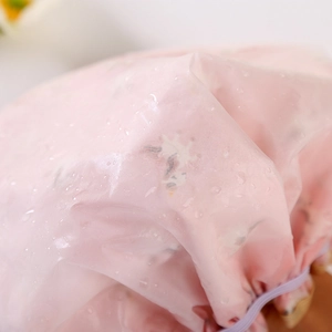 Pink double-layer waterproof shower cap with elastic band and lotus effect water drops