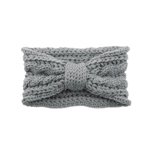 Detailed view of the thick gray knitted texture and bow design on the winter headband