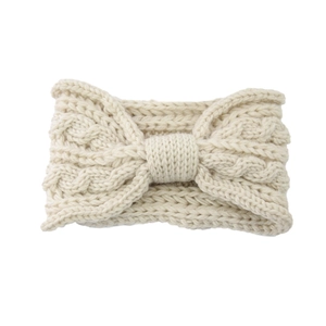 Classic cream cable knit headband with a bow design made of thick warm yarn fabric