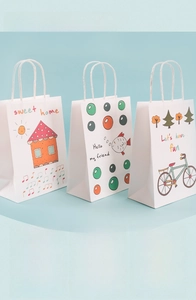 Three-pack cartoon gift bags with white rope handles and whimsical hand-drawn illustrations