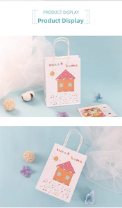 Detailed view of white paper gift bag with sweet home cartoon and soft rope handles