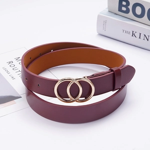 Women's burgundy waist belt with a stylish gold double ring buckle on white background