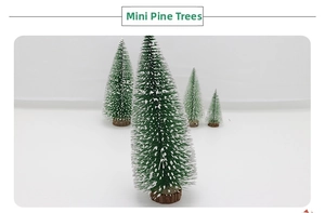 Macro detail of four mini pine needle trees with snowy finish and wooden bases