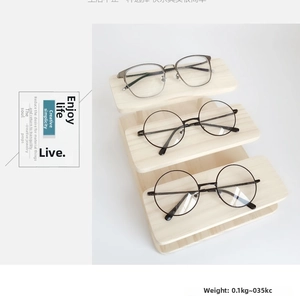Three-tier solid wood tiered display stand for glasses and jewelry with smooth natural finish