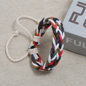 Detail of colorful hand-woven braided wax cord bracelet with adjustable sliding knot