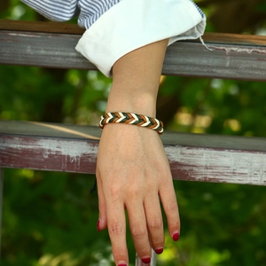 Handmade woven couple bracelet with tricolor wax cord in a minimalist ethnic style