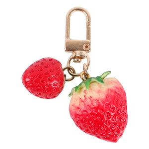 Cute strawberry keychain featuring two realistic resin pendants with a gold metal hook
