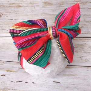 Baby DIY wide headband featuring a large vibrant multi-colored striped fabric bow