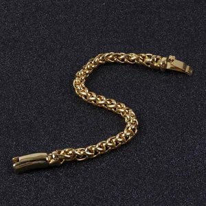 Golden titanium steel braided chain bracelet for men displayed on black textured background
