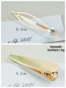 Detail view of gold alloy hairpins with dimensions and weights for elegant women's accessories